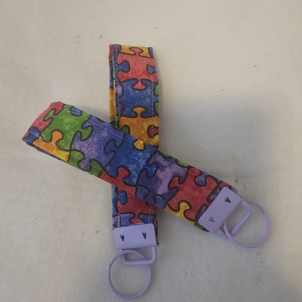 Rainbow Puzzle Piece Pacifier Clip Set